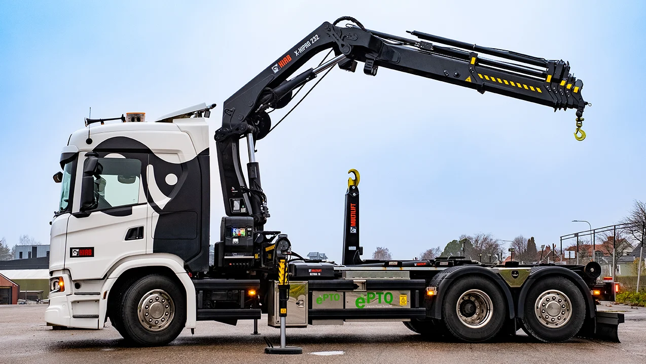 Loader crane unloading pallets from a truck in Bexleyheath